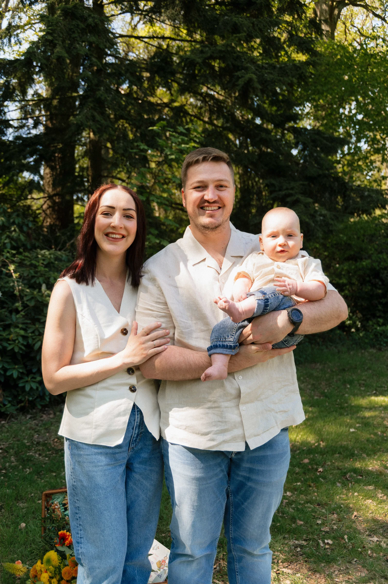 Mom, dad and 2 year old son family portrait